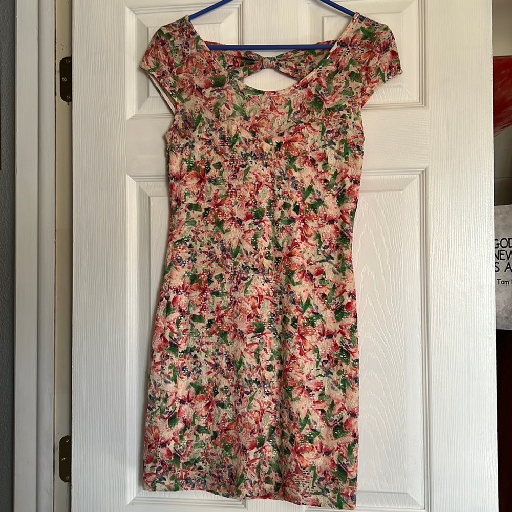 Free People Multicolored stretchy dress.  Open cut dress in back
